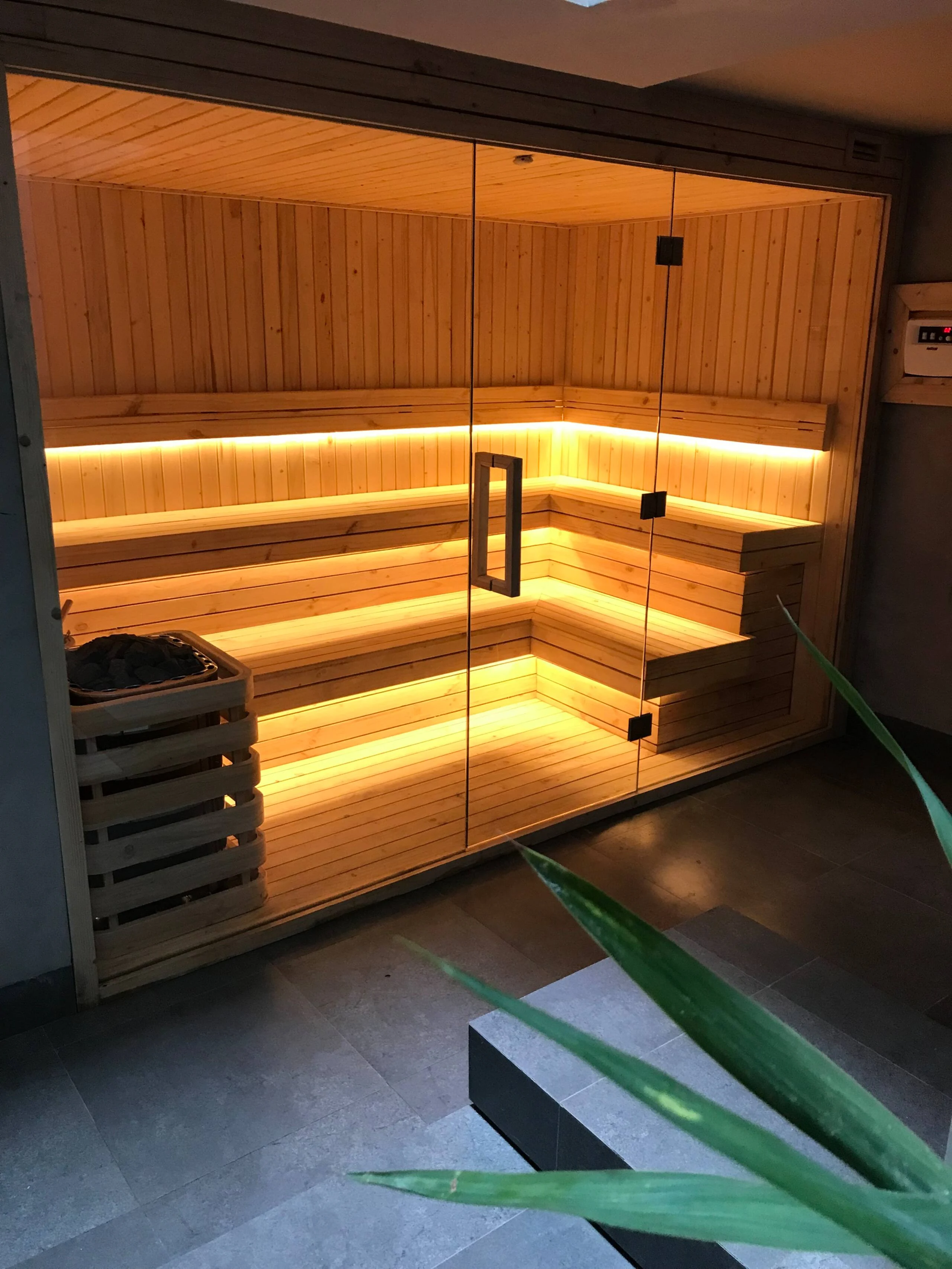 Warmly lit wooden sauna